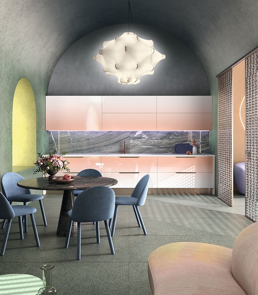 Cucina contemporanea con superfici effetto pietra, tonalità pastello e arredi dalle linee morbide.