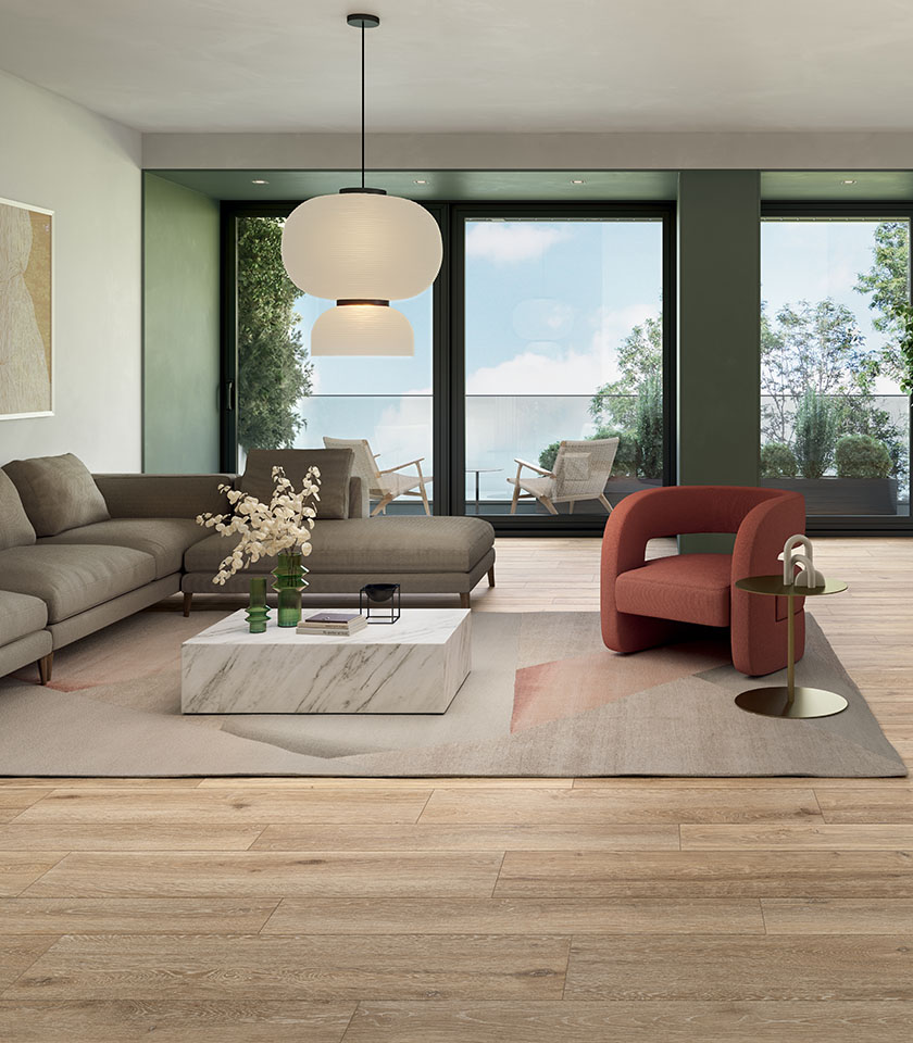 Living contemporaneo con pavimento della collezione Bio Attitude effetto legno nella tonalità Amber.