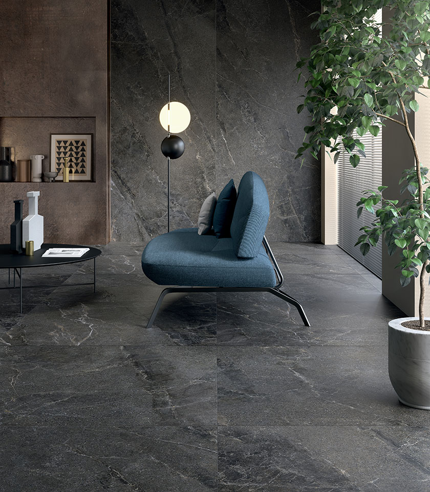 Scopri idee per un soggiorno moderno con superfici effetto pietra Lea Ceramiche, ideali per creare ambienti eleganti, materici e dal forte impatto visivo.