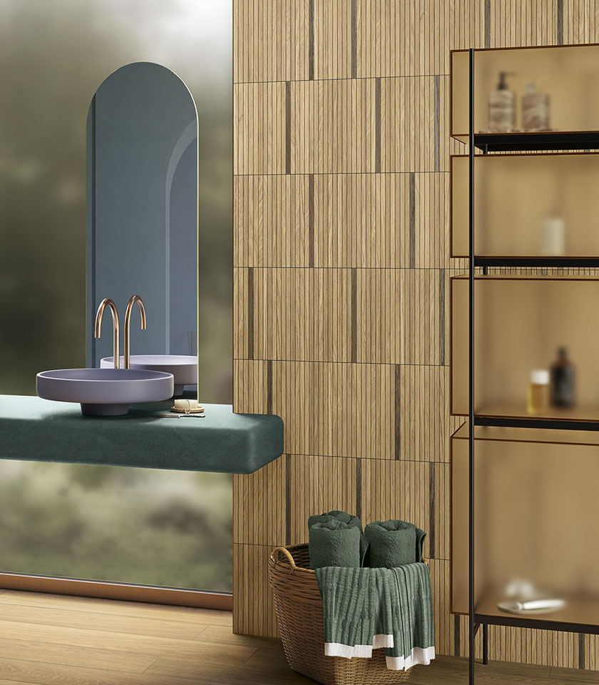 Scopri come creare un bagno effetto legno elegante e accogliente con superfici, texture e soluzioni di design che uniscono estetica, comfort e funzionalità.
